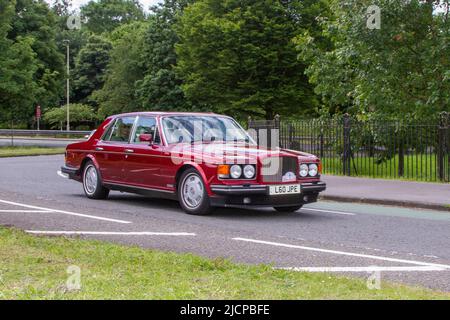 1994 90s nineties red Bentley Brooklands 6750cc petrol 3 speed automatic; automobiles featured during the 58th year of the Manchester to Blackpool Touring Assembly for Veteran, Vintage, Classic and Cherished cars. Stock Photo