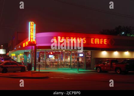 Neon signs featured on the facade of Lucky's Cafe in Dallas Texas Stock Photo