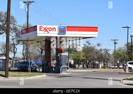 Exxon gas station pumps at a 7-11 store in Irving, Texas Stock Photo