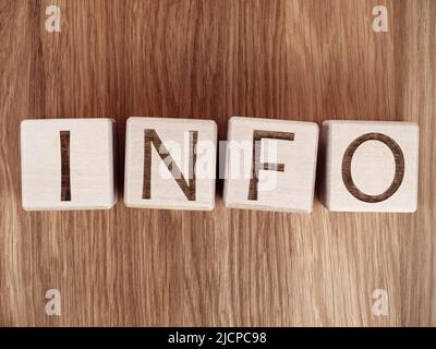 Word INFO on wooden blocks as information support concept Stock Photo