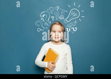 Great idea. Clever attentive creative child girl portrait Stock Photo