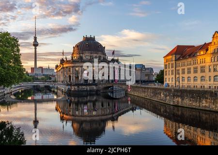 The Bode Museum on Museum Island and the Monbijou bridge. Historic listed buildings next to Spree River, Mitte, Berlin. Stock Photo