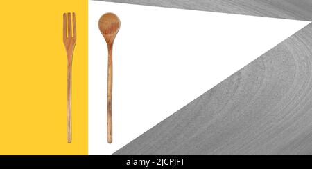 Topview of Set Cooking Wooden Utensils on Light Colored Background Stock Photo
