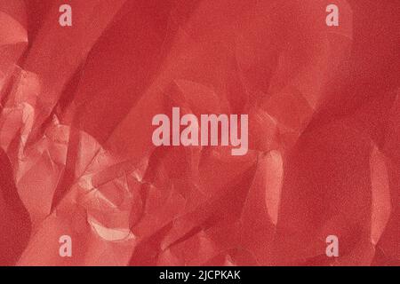 an empty wrinkled red pearl tissue paper textured background. text space for quotations Stock Photo