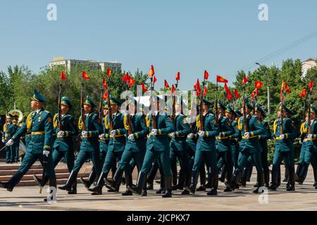 Bishkek, Kyrgyzstan - May 9, 2022: Kyrgyzstan army forces marching during a military parade on Victory Day Stock Photo