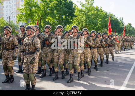 Bishkek, Kyrgyzstan - May 9, 2022: Kyrgyzstan army forces marching during a military parade on Victory Day Stock Photo