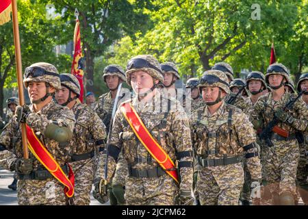 Bishkek, Kyrgyzstan - May 9, 2022: Kyrgyzstan army forces marching during a military parade on Victory Day Stock Photo