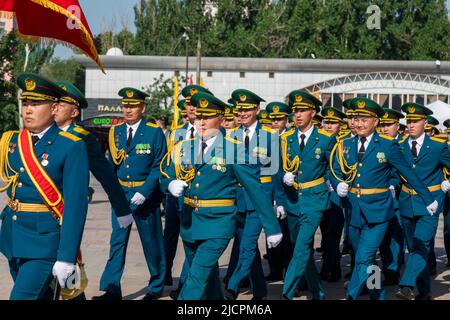 Bishkek, Kyrgyzstan - May 9, 2022: Kyrgyzstan army forces marching during a military parade on Victory Day Stock Photo