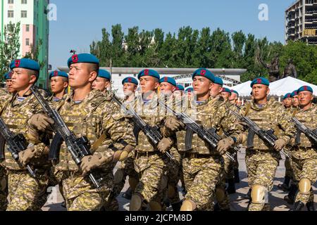 Bishkek, Kyrgyzstan - May 9, 2022: Kyrgyzstan army forces marching during a military parade on Victory Day Stock Photo