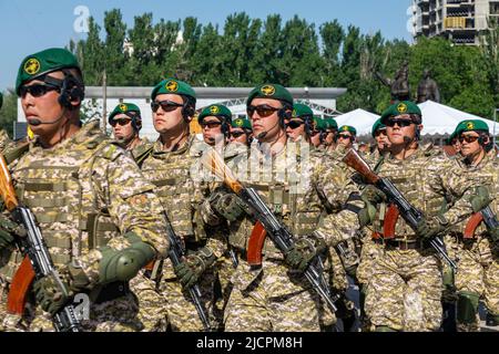 Bishkek, Kyrgyzstan - May 9, 2022: Kyrgyzstan army forces marching during a military parade on Victory Day Stock Photo