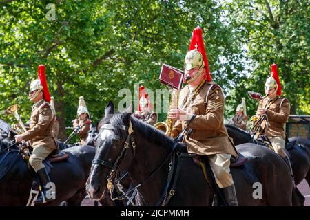 Queens Household Cavalry band riding horses along the Mall rehearsing for Trooping the Colour in London, England, United Kingdom Stock Photo