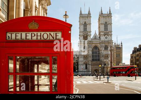 Red telephone box and Westminster Abbey, London, England, United Kingdom on Wednesday, May 18, 2022.Photo: David Rowland / One-Image.com Stock Photo