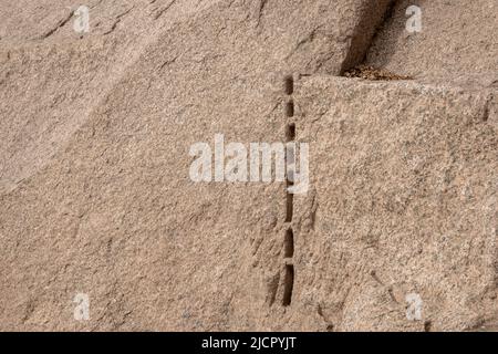 Ancient granite quarry workings in Aswan, Upper Egypt Stock Photo