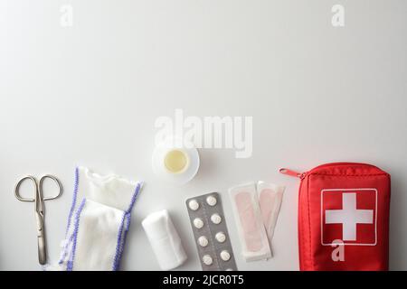 various medical objects for cures and first aid on white table. Top view. Horizontal composition Stock Photo