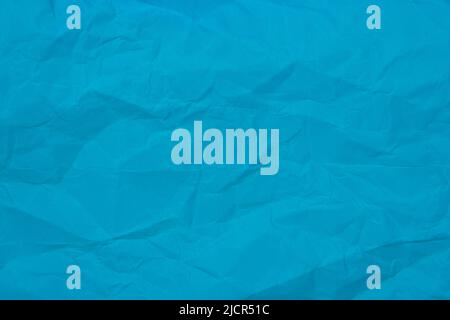 Crumpled blue paper craft textured background Stock Photo