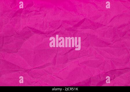 Crumpled pink paper craft textured background Stock Photo