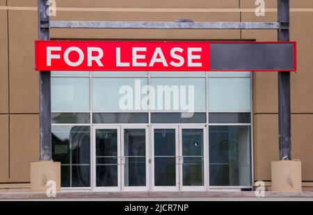 Signboard on property mall – Retail space for lease. Property leasing or real estate concept. Copy space. Stock Photo