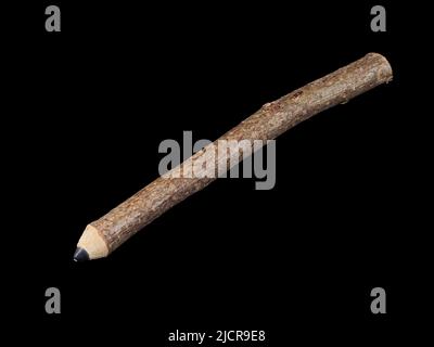 Black pencil stylized from a branch isolated on a black background Stock Photo