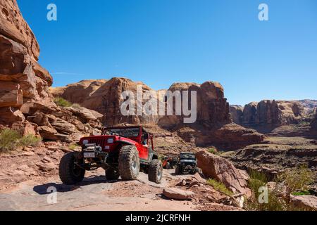 Jeeps off roading near Moab in Utah, USA. Stock Photo