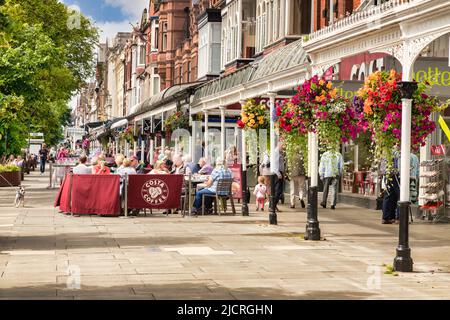 14 July 2019: Southport, Merseyside, UK - Lord Street, the seaside town's main shopping street, with a Costa Coffee Shop, lots of people sitting at... Stock Photo