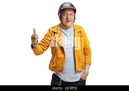 Man in a yellow leather jacket and black helmet showing thumb up isolated on white background Stock Photo