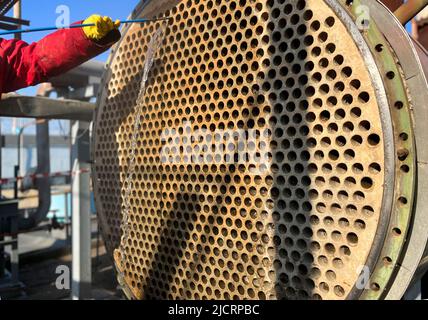 Cleaning of heat exchange equipment with a high-pressure hydraulic unit. Washing the shell and tube heat exchanger Stock Photo