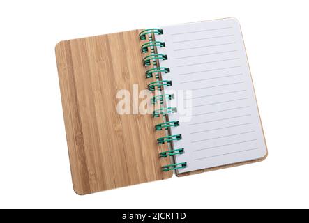Spiral notepad isolated on white background. Blank wooden cover green binder pad, hardcover open notebook, copy space Stock Photo