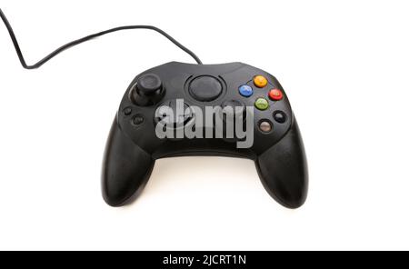 Game controller isolated on white background. Overhead video gaming console control, black color Stock Photo