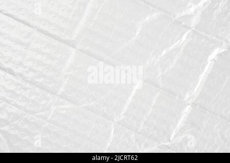 Folded crumpled bubble wrap foil background Stock Photo