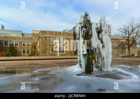 PRINCETON, NJ USA - NOVENBER 12, 2019:  Princeton Fountain, where water froze and it was covered with ice. Stock Photo