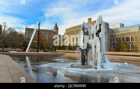 PRINCETON, NJ USA - NOVENBER 12, 2019:  Princeton Fountain, where water froze and it was covered with ice. Stock Photo