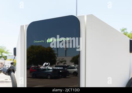 ALFAFAR, SPAIN - JUNE 06, 2022: Electric car charging station powered by Iberdrola Stock Photo