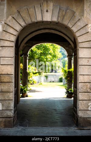 Image of an arched passage in an old town. Stock Photo