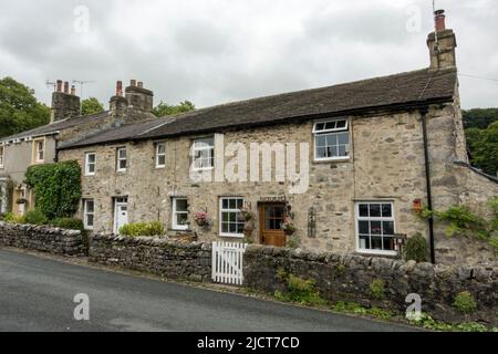 Beautiful stone cottages in the town of Langcliffe, on the edge of the Yorkshire Dales National Park, North Yorkshire, UK. Stock Photo