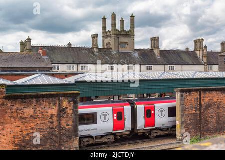 View of Shrewsbury Railway station from the rear and across the platforms. A train has stopped to pick up passengers. Stock Photo