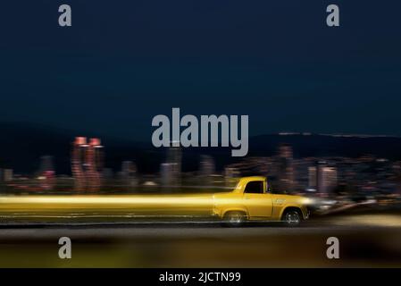 Fast going toy model car with motion blur and on a motion blur background. Stock Photo