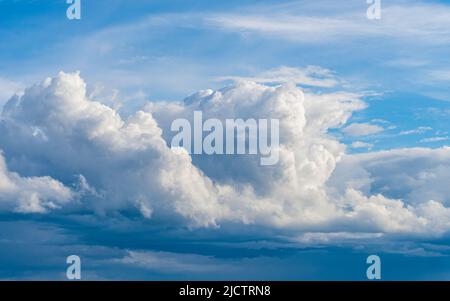 Dramatic Clouds on blue sky Stock Photo