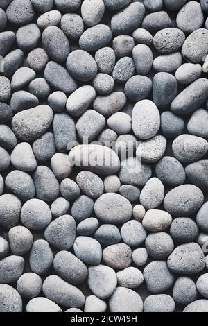 Gray pebbles texture, natural stones background, zen, summer, beach, full frame Stock Photo