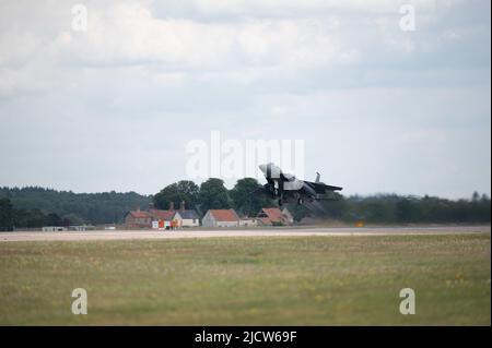 A U.S. Air Force F-15E Strike Eagle assigned to the 492nd Fighter Squadron, 48th Fighter Wing, takes off to participate in BALTOPS 22 at Royal Air Force Lakenheath, England, on June 14, 2022. BALTOPS is a premier maritime focused exercise in the Baltic Region where maritime and air forces work together to exercise medical evacuation, joint personnel recovery, and enhance cohesion and interoperability with allies and partners. These activities enhance the readiness necessary to respond to any potential challenge in the region. (U.S. Air Force photo by Senior Airman Koby I. Saunders) Stock Photo