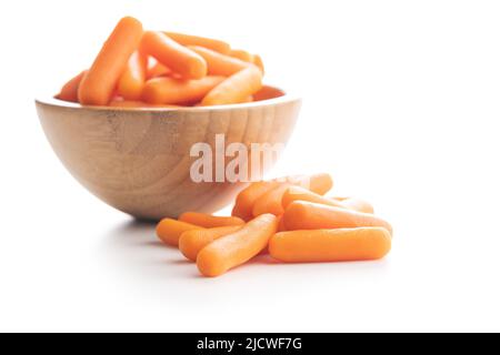 Baby carrot vegetable. Mini orange carrots isolated on white background. Stock Photo
