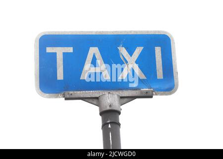 Close-up view of a worn blue taxi rank sign isolated on white background. Stock Photo