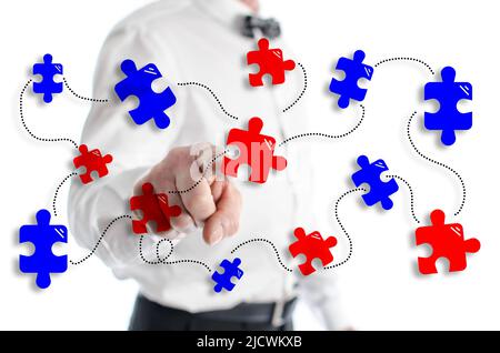 Teamwork concept shown by a man in background Stock Photo