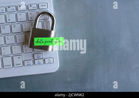 Padlock with text DATA PROTECTION on computer keyboard. Data protection, cyber security concept Stock Photo