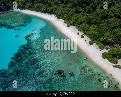 (220616) -- REDANG ISLAND, June 16, 2022 (Xinhua) -- Aerial photo taken on June 14, 2022 shows the Chagar Hutang Turtle Sanctuary located at the northern part of Redang Island, Terengganu, Malaysia. The Chagar Hutang Turtle Sanctuary is one of the main nesting sites for green and hawksbill turtles. The annual nesting period for green sea turtles usually falls around March to October, with a peak in May to July. In 2005, the Terengganu State government declared Chagar Hutang beach as a sea turtle sanctuary. Since then, Chagar Hutang has been restricted to the public, allowing only researche Stock Photo