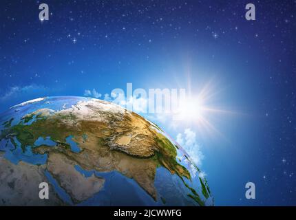 Global warming on Planet Earth, viewed from space focusing on East Asia, China, Russia. Earth globe in deep space, sun rising on the horizon. Stock Photo