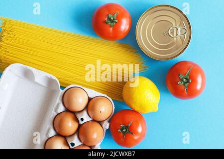 Different healthy food products on a blue background. Top view. Flat lay. Grocery online shop background Stock Photo