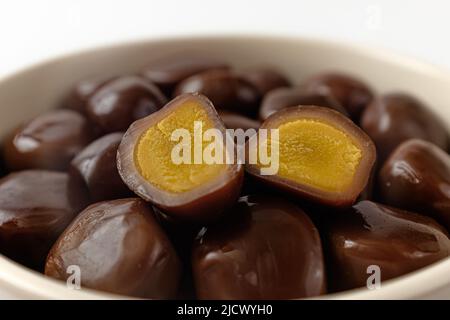 smoked quail eggs on a white background Stock Photo