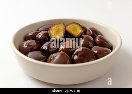 smoked quail eggs on a white background Stock Photo