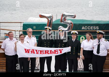 Captain Dominic McCall (4th left) with crew members onboard the Waverley Paddle Steamer before it leaves Greenock as it celebrates the 75th anniversary of its maiden voyage. Picture date: Thursday June 16, 2022. PA Photo credit should read: Andrew Milligan/PA Wire Stock Photo
