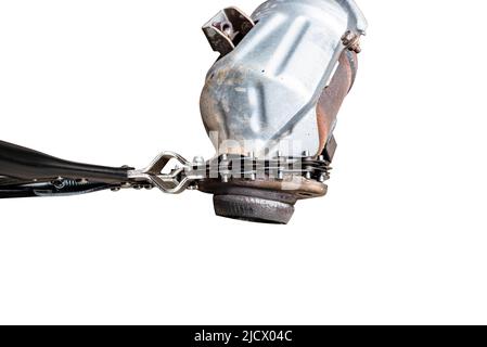 Large car catalytic converter with pipe shears, isolated on a white background with a clipping path. Stock Photo